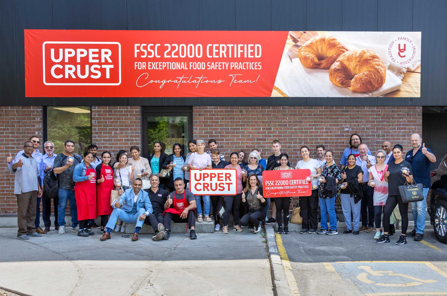 Upper Crust team members celebrating achievement of FSSC 22000 certification