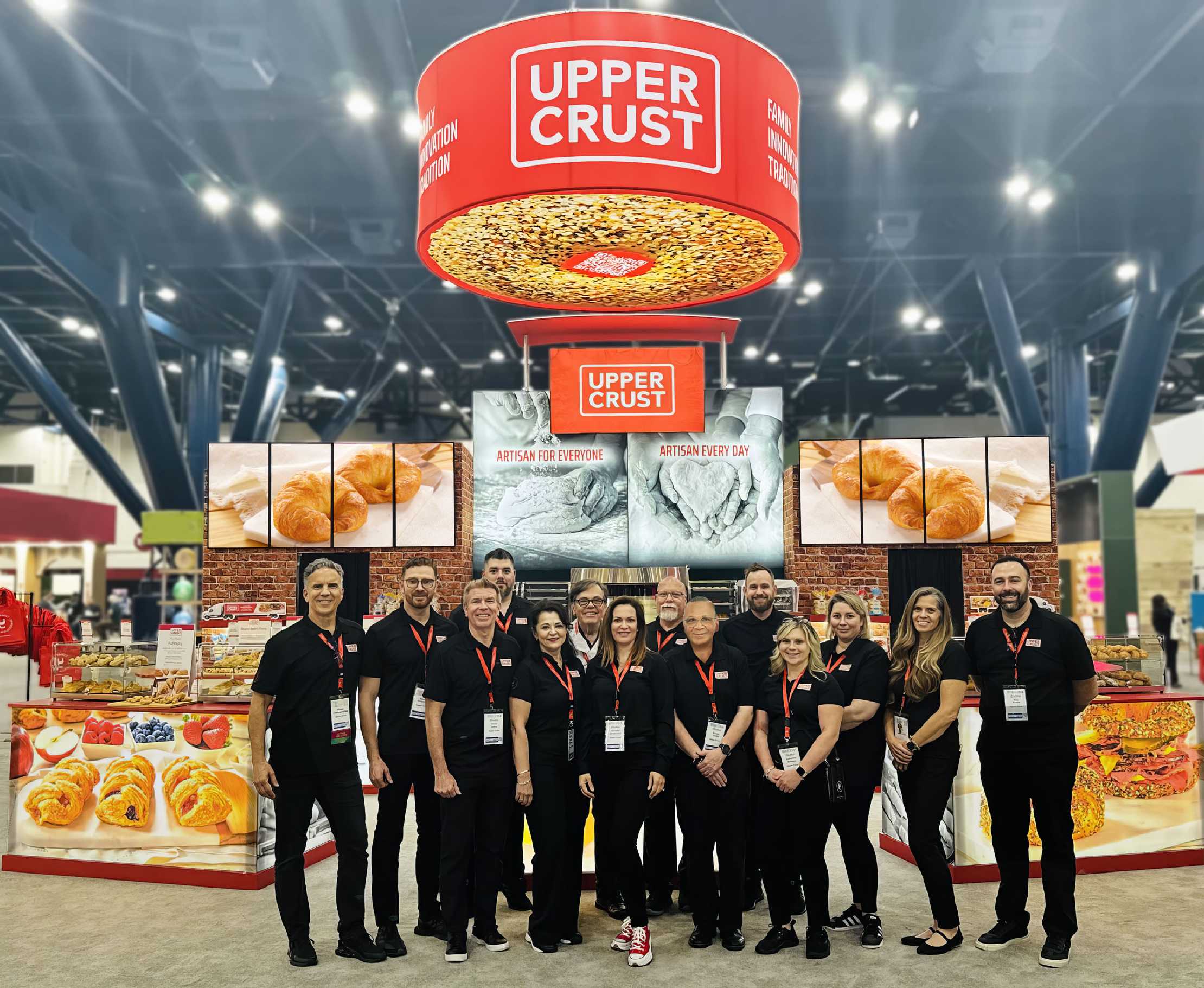 Upper Crust booth photo with sales team