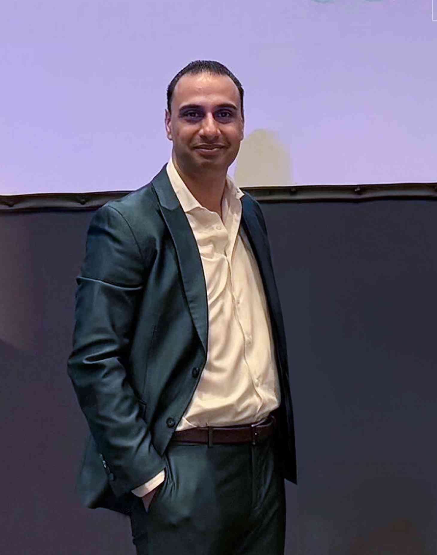 Sonny Brar in front of stage